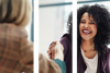 Two women shake hands as one facing the viewer smiles. Image is separated into 3 columns.