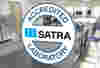 a SATRA accredited laboratory logo window sticker on the window of a modern lab