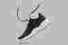 Image of a modern training shoe hovering in a white space